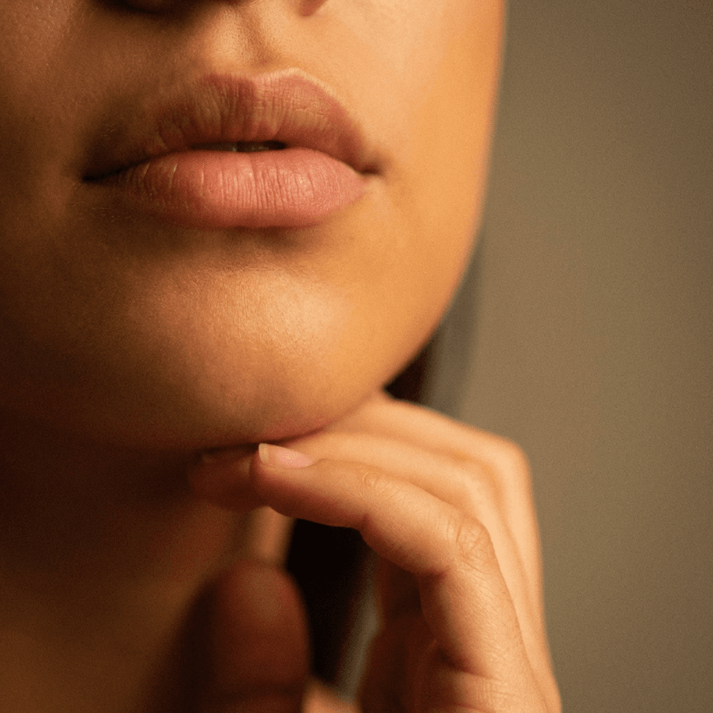 Natural lip enhancement results after dermal filler treatment at MedBeauty Aesthetics Michigan